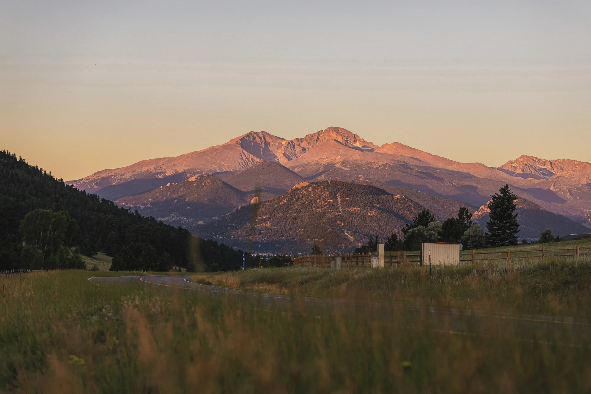 Alpenglow on Longs Peak above Estes Park, Colorado at sunrise